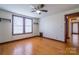 Bedroom featuring hardwood floors, a ceiling fan, closet, and natural light at 7740 Us 52 Hwy, Salisbury, NC 28146