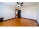 Bedroom features hardwood floors and staircase to another level at 7740 Us 52 Hwy, Salisbury, NC 28146