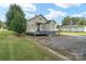 Yard with house, deck, gravel, and green grass at 7740 Us 52 Hwy, Salisbury, NC 28146