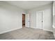 Bright bedroom includes carpet, closet and a entry with recessed lighting and neutral paint at 9615 Riviera Dr, Sherrills Ford, NC 28673