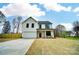 Charming new construction home with a two-car garage, a large driveway, and a covered front porch at 9615 Riviera Dr, Sherrills Ford, NC 28673