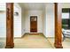 Front porch of new home with stained wood columns and trim accents, as well as craftsman style door at 9615 Riviera Dr, Sherrills Ford, NC 28673