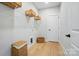 Well-organized laundry room with storage baskets, shelving, and space for appliances at 9615 Riviera Dr, Sherrills Ford, NC 28673