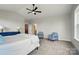 Spacious primary bedroom offering a walk-in closet and en-suite bathroom at 9615 Riviera Dr, Sherrills Ford, NC 28673