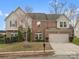 Charming two-story brick home with well-maintained landscaping and attached two-car garage at 9823 Shearwater Nw Ave, Concord, NC 28027