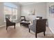 Cozy living room offering natural light, stylish furnishings, and inviting atmosphere at 9823 Shearwater Nw Ave, Concord, NC 28027