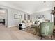 Comfortable living room with neutral palette, fireplace, and modern furnishings at 9823 Shearwater Nw Ave, Concord, NC 28027