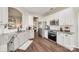 Modern kitchen with stainless steel appliances, granite countertops, and white cabinets at 10390 Tintinhull Dr, Indian Land, SC 29707