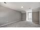 Bright bedroom with gray walls, neutral carpet, and beadboard trim at 107 Rutledge Rd, Mount Holly, NC 28120