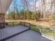 Back deck showcasing wooded backyard at 107 Rutledge Rd, Mount Holly, NC 28120