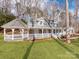 Lovely exterior view of the home showcasing its gazebo, covered porch, and well-manicured lawn at 107 Rutledge Rd, Mount Holly, NC 28120