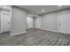 Finished basement with painted walls, neutral-toned floor, modern lighting, and convenient closet and storage space at 108 Spiral Ln, Shelby, NC 28152