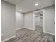 Finished basement with recessed lighting, wood-look flooring, and neutral walls at 108 Spiral Ln, Shelby, NC 28152