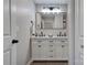 Bright bathroom featuring a double sink vanity with modern fixtures and lighting at 108 Spiral Ln, Shelby, NC 28152