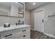 Bathroom featuring modern vanity with marble countertop and stylish black hardware at 108 Spiral Ln, Shelby, NC 28152