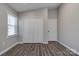 Bedroom featuring a closet with standard doors and wood-look flooring at 108 Spiral Ln, Shelby, NC 28152