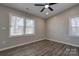 Bright bedroom featuring modern flooring, neutral walls, and updated windows at 108 Spiral Ln, Shelby, NC 28152