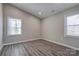 Bedroom with wood-look floors and two windows allowing for ample natural light at 108 Spiral Ln, Shelby, NC 28152