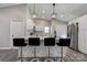 Kitchen island with bar seating, modern fixtures, and stainless steel appliances at 108 Spiral Ln, Shelby, NC 28152