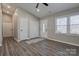 Bright living room with modern flooring, updated windows, and neutral paint at 108 Spiral Ln, Shelby, NC 28152