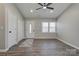 Bright living room with modern flooring, updated windows, and neutral paint at 108 Spiral Ln, Shelby, NC 28152