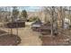 View of multiple brick outbuildings and metal sheds situated on the property at 1135 Ben Black Rd, Midland, NC 28107