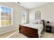 Cozy bedroom featuring natural light and a comfortable bed at 130 Monteray Oaks Cir, Fort Mill, SC 29715