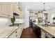 Well-equipped kitchen featuring granite countertops, stainless steel appliances, and ample cabinet space at 130 Monteray Oaks Cir, Fort Mill, SC 29715