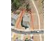 An aerial view of a single-Gathering home with a large backyard featuring a garden and stone patio at 1300 Dali Blvd, Mount Holly, NC 28120