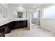 Bathroom with a large framed mirror, dual sink and a shower at 1300 Dali Blvd, Mount Holly, NC 28120
