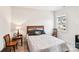 Cozy bedroom with natural light from a window and classic wood furniture at 1300 Dali Blvd, Mount Holly, NC 28120