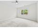 Bedroom with a ceiling fan and a window with natural lighting at 1300 Dali Blvd, Mount Holly, NC 28120