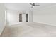 Spacious bedroom with ceiling fan and a walk in closet at 1300 Dali Blvd, Mount Holly, NC 28120