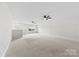 Large bonus room with two ceiling fans at 1300 Dali Blvd, Mount Holly, NC 28120