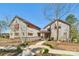 Charming exterior featuring wood siding, well-manicured landscaping, and a welcoming walkway at 1300 Dali Blvd, Mount Holly, NC 28120