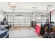 Spacious garage with multiple doors, concrete floor, and ample storage space for vehicles and equipment at 1300 Dali Blvd, Mount Holly, NC 28120