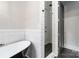 Well-appointed bathroom with a free-standing tub and tiled shower at 1418 Seigle Ave, Charlotte, NC 28205