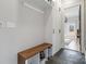 Mudroom with custom cabinets, wood bench, and slate flooring at 1418 Seigle Ave, Charlotte, NC 28205