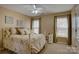 Comfortable bedroom featuring natural light, neutral color palette, and comfortable bed at 15100 Durmast Ct, Mint Hill, NC 28227