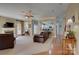 Inviting living room with cozy fireplace and seamless flow to the kitchen, creating a perfect space for gatherings at 15100 Durmast Ct, Mint Hill, NC 28227