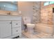 The bathroom features a white vanity, marble-patterned tiles, and tub/shower combo at 155 31St Sw St, Hickory, NC 28602