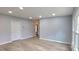 Living room with ample natural light, recessed lighting, neutral paint, and wood-look floors at 155 31St Sw St, Hickory, NC 28602