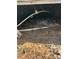 View of dirty crawl space with standing water, exposed wires, and debris at 185 Flat Stone Dr, Clover, SC 29710