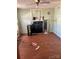 View of vacant living room with hardwood floors and dark fireplace at 185 Flat Stone Dr, Clover, SC 29710