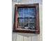 Close up of window with 12 panes and weathered wooden frame at 185 Flat Stone Dr, Clover, SC 29710