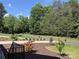 View from the porch showing landscaping and the street in front of the property at 220 Kenway Loop, Mooresville, NC 28117