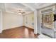 Bright living room with hardwood floors, white trim, ceiling fan and lots of natural light at 220 Kenway Loop, Mooresville, NC 28117