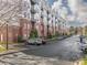 Modern apartment building exterior showcasing architectural design and parking area at 2338 Yadkin Ave # 503, Charlotte, NC 28205