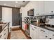 Bright kitchen features stainless steel appliances and black granite countertops at 2338 Yadkin Ave # 503, Charlotte, NC 28205