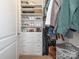 Walk-in closet with built-in shelving and drawers provides storage and organization at 2338 Yadkin Ave # 503, Charlotte, NC 28205